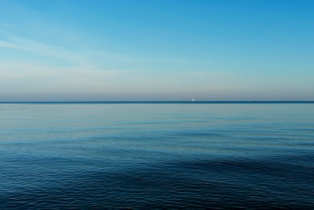 Wandbild,  Blaue Horizont Meerlandschaft. Erhätlichlich in verschiedenen Leinwand und Fotoposter Formaten.